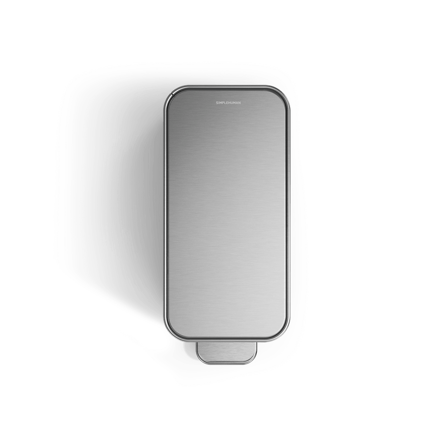 Simplehuman's 9L Slim Step Can in Brushed top view showcasing the lid and pedal of the can. 