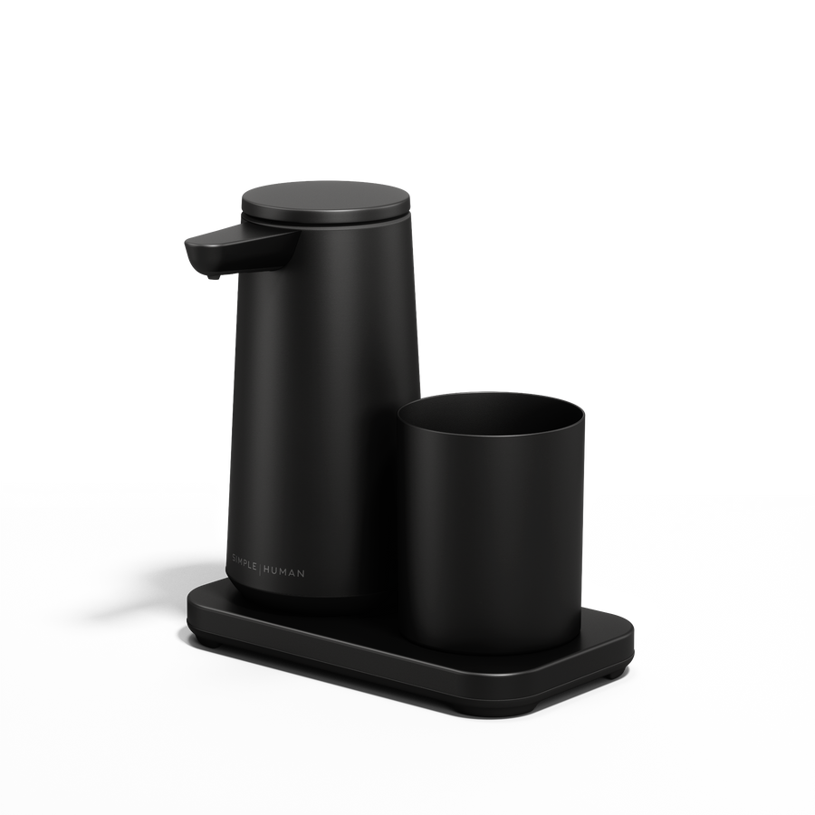 Angled view: Simplehuman Matte Black touch-free Foam Pump and Cup set on drip-free base.