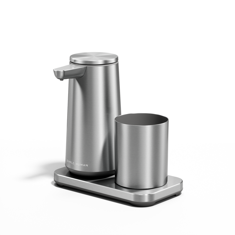 Angled view: Simplehuman Brushed Stainless Steel touch-free Foam Sensor Pump and removable Cup on drip-free base.