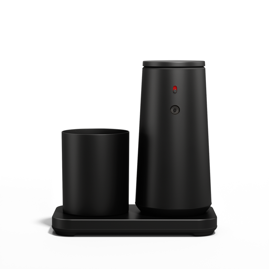 Low-angle view: Simplehuman Matte Black touch-free Foam Sensor Pump and Cup set with drip-free base.