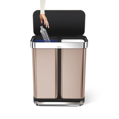 58L dual compartment rectangular step can with liner pocket - rose gold stainless steel - hand dropping bottle in bucket image