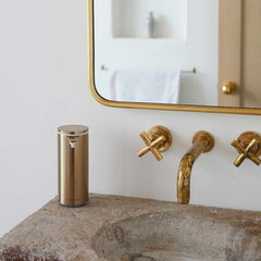 rechargeable liquid soap sensor pump- brass finish - lifestyle in bathroom image